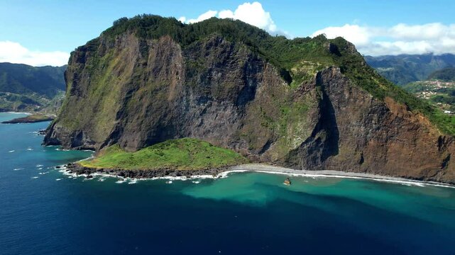 amazing Madeira island nature scenery. aerial 4k hd video of beautiful rocky coast and Faial village in northern part. Portugal