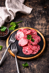 Sliced spicy tasty salami sausage