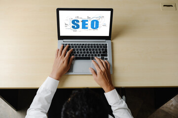 SEO search engine optimization for modish e-commerce and online retail business showing on computer...