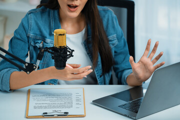Host channel Asian influencer talking in broadcast streaming online wearing headset on social media...