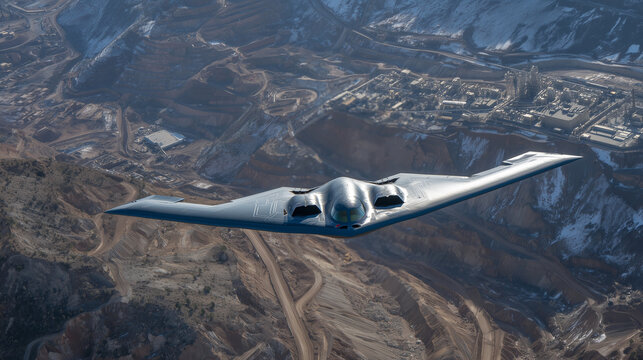 Fototapeta B-2 seen from a dramatic top-down view as it patrols skies above a camouflaged chemical plant built into a remote plateau