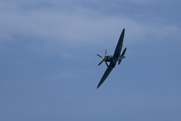 Spitfire plane in flight on sunny day. High quality photo