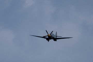 Spitfire plane in flight on sunny day. High quality photo