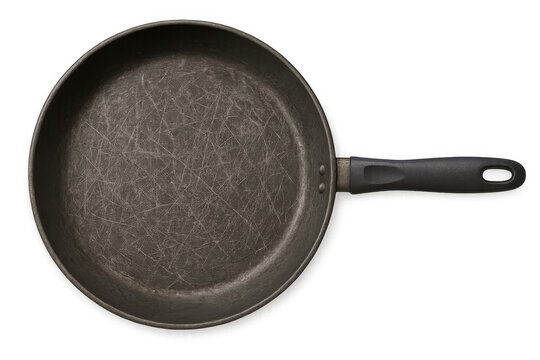 Old frying pan with scratches on transparent background