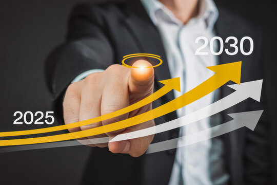 A businessman in a suit points forward, interacting with a futuristic graph showing growth trends leading to 2030. The image conveys advancement, innovation, and strategic progress.