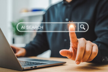 A person interacts with a digital AI search bar, highlighting the search icon with their finger. A laptop outlines the focus on technology, innovation, and artificial intelligence tools. 