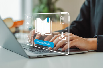 A user types on a laptop, displayed with a digital overlay showing an open book icon and a "Download Ebook" button, illustrating online ebook access. Ideal for ebook publishing or digital marketing.