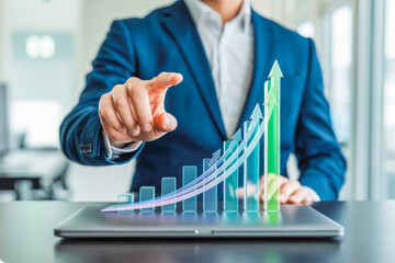 A business professional in a blue suit interacts with a 3D digital bar graph displaying upward trends on a laptop screen, symbolizing growth, success, and data-driven decision-making. 