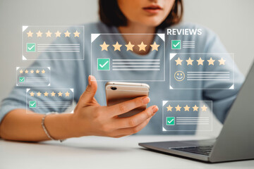 A woman in a grey shirt holds a smartphone, surrounded by digital five-star reviews. She is in front of a laptop, signifying online reputation management and customer feedback analysis.