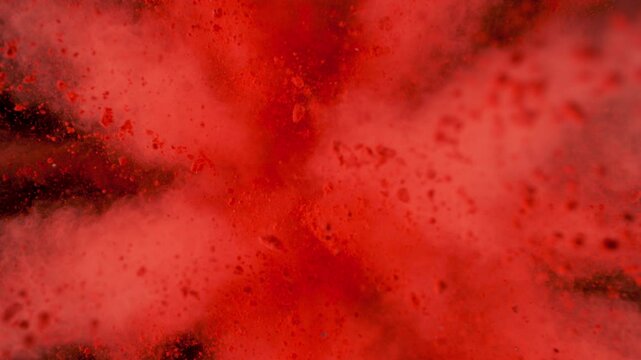 Super Slow Motion Shot of Red Color Powder Explosion on Black Background at 1000fps.