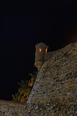 Illuminated watchtower on the Royal Walls of Ceuta