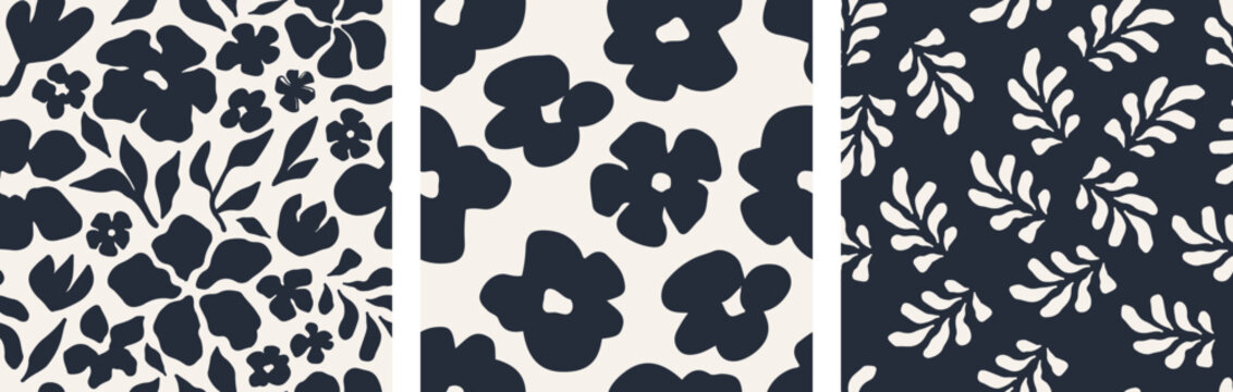 Abstract floral seamless pattern set with hand-drawn black flowers and leaves silhouettes on a light background. Modern, organic style is perfect for fabric, wrapping paper, and stationery. Vector art