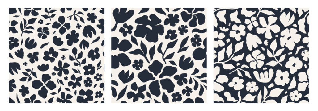 Abstract floral seamless pattern set with hand-drawn navy floral and botanical silhouettes on a light cream background. Modern, organic style perfect for fabric, wrapping paper, stationery. Vector art