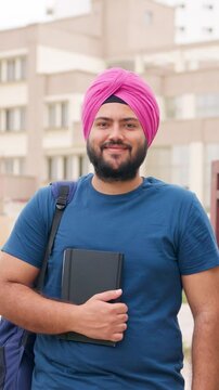 Vertical Video of Sikh Indian Student Looking in the Camera and Smiling