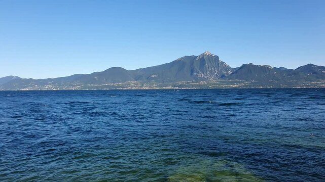 Scenic aerial footage of Lake Garda in Italy during a serene morning