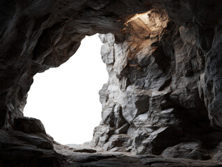 Dramatic Cave Entrance Sunlight Illuminating Natural Rock Formation with an Open Exit Leading to Bright Light