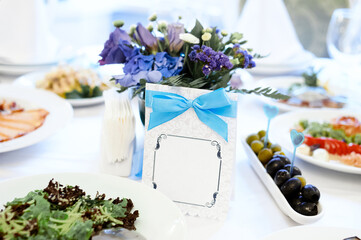Elegant Table Setting With Flowers and Place Card for a Formal Event