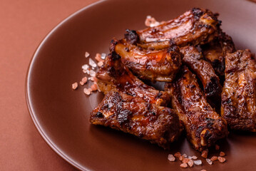 Meat, beef ribs in a marinade grilled with salt and spices. Grilled ribs