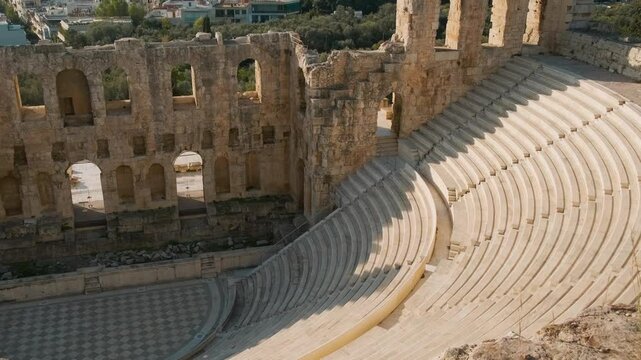 Odeon of Herodes Atticus stone Roman theatre on Acropolis of Athens, Greece. Ancient Greek architecture. Popular travel and touristic landmark