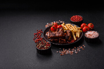 Meat, beef ribs in a marinade grilled with salt and spices. Grilled ribs