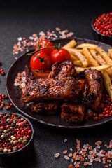 Meat, beef ribs in a marinade grilled with salt and spices. Grilled ribs
