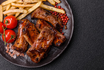 Meat, beef ribs in a marinade grilled with salt and spices. Grilled ribs