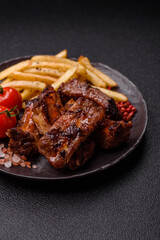 Meat, beef ribs in a marinade grilled with salt and spices. Grilled ribs