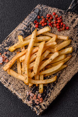 Food, French fries fried with salt and rosemary. Homemade crispy chips