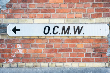 Sign of the governmental OCMW CPAS center for social welfare in Kampenhout, Flemish Brabant, Belgium