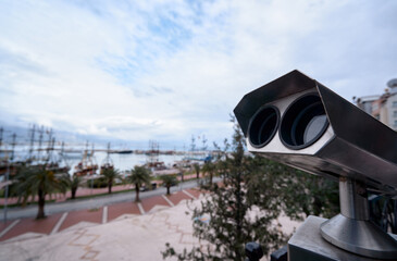 Tower Viewer Overlooking Scenic Waterfront Promenade and Palm Trees