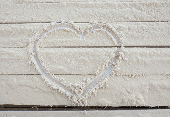 heart drawn on small wood shavings. symbol of love, fidelity and friendship. declaration of feelings