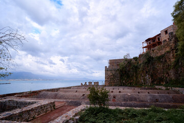 Rustic Coastal Scene Featuring Stone Ruins and Serene Ocean View