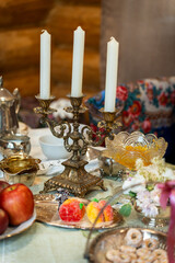Elegant Table Setting with Candelabra and Sweets