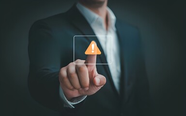 System warning alert on virtual interface with hand interaction. Concept of cybersecurity risk, data breach, malware, hacking, IT failure, and digital system vulnerability in modern technology threat