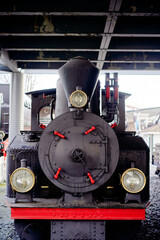 Close-Up View of a Vintage Steam Locomotive Train Engine Front