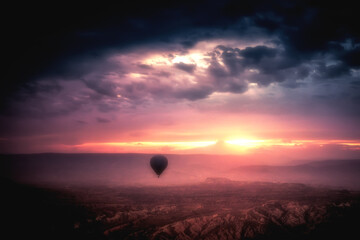 Magnificent Sunset Landscape with a Hot Air Balloon