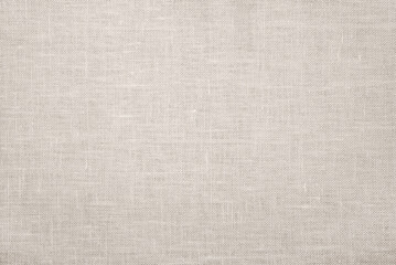 Texture of beige linen fabric.