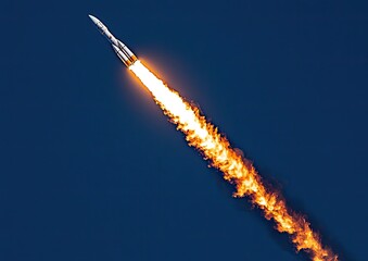 Rocket launch in dark night sky
