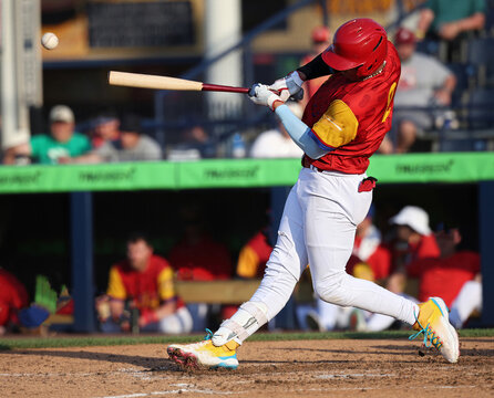 red uni baseball player