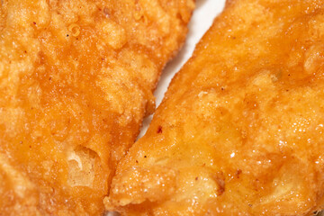 Close up of golden fried chicken or tofu batter cooked