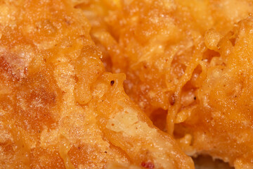Close up of golden fried chicken or tofu batter cooked