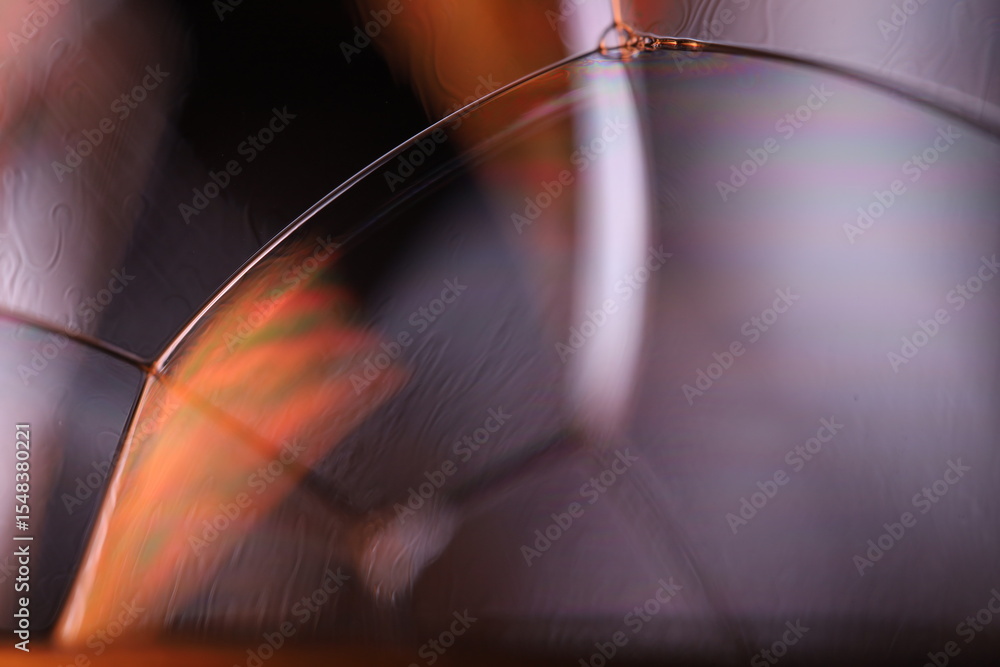 Fototapete red reflections of liquid in macro, red liquid surface, bubbles in macro, connection of bubbles in m