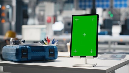 Chroma key display on tablet in photovoltaics facility used for solar panels, overseeing...