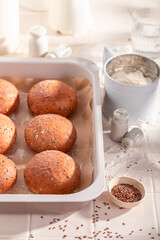 Homemade and healthy flax seed buns freshly baked in bakery.
