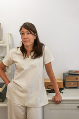 Alternative medicine therapist standing in acupuncture clinic