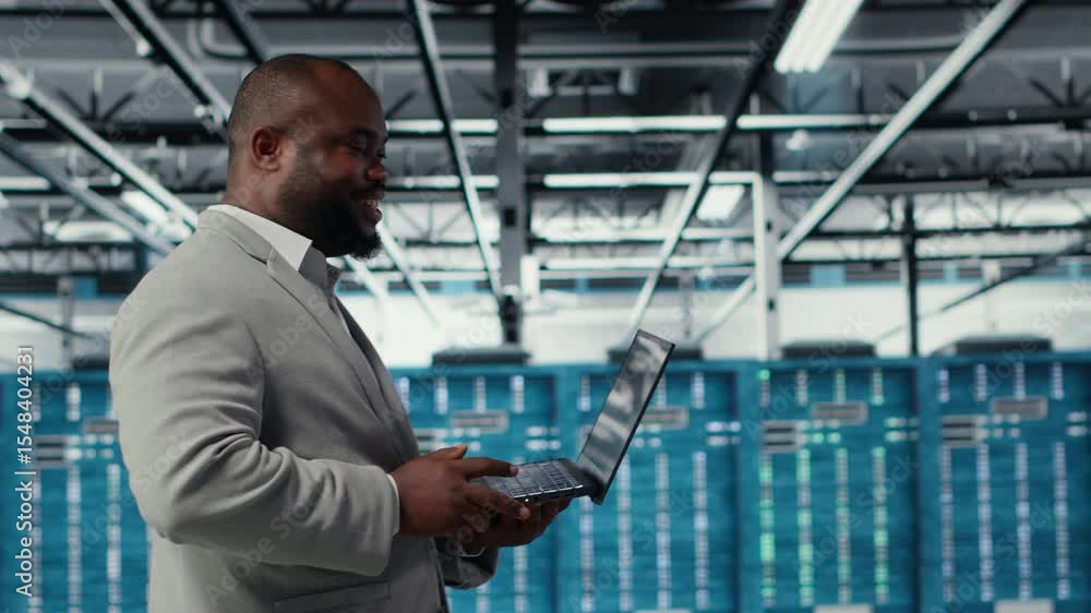 Poster server room infrastructure engineer scripting automated workflows using software on laptop. data cen