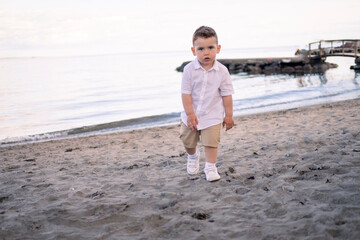 Child enjoying a quiet beach afternoon.