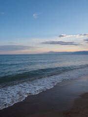 Waves Crashing on Sandy Beach Seashore