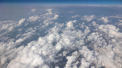 Experience the Captivating Aerial View of Beautiful Clouds and the Clear Blue Sky Above You