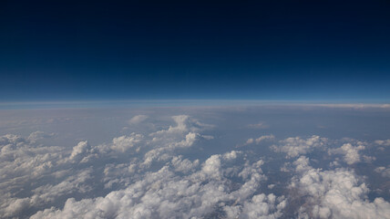 Experience the Captivating Aerial View of Beautiful Clouds and the Clear Blue Sky Above You